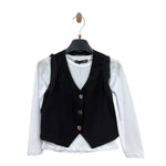 Maglia in cotone e gilet con frange