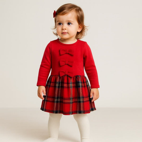 Abitino a maniche lunghe con fiocchetti decorativi